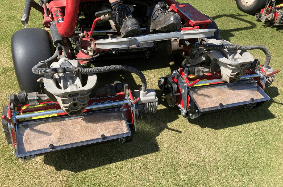 overseeding forefront greens - dyna-seeder with grass seed